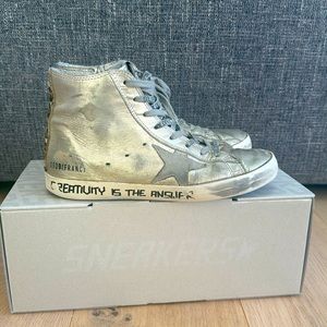 Golden Goose France high top in Gold with leopard heel.